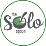 Logo of "The Solo Spoon" with a spoon scooping from a green bowl, surrounded by a green circular border.