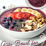 Acai bowl topped with banana, strawberries, blueberries, granola, almonds, and chia seeds, with a small bowl of blended acai in the corner and text promoting a single serving acai bowl recipe.